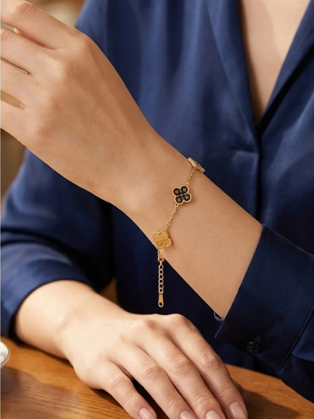 Fashion Jewelry Gold-Tone Bracelet with Black Clover Motifs